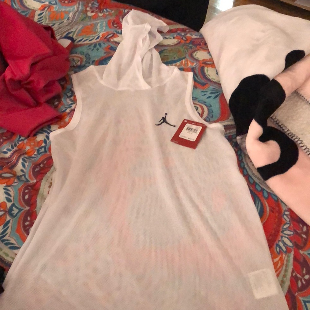 Jordan shirt , XL KIDS BUT CAN FIT SMALL WOMEN .